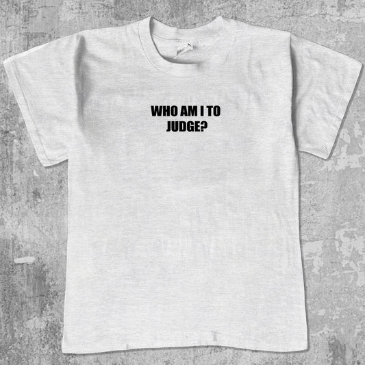 Who Am I To Judge graphic tee with funny saying print, funny and trendy graphic. Perfect for adults and gift-giving. Ash Grey shirt.