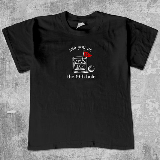 See You At The 19th Hole unisex graphic t-shirt. Vintage trending meme tee. Funny and unique graphic tees. See You At The 19th Hole graphi tee Black 1
