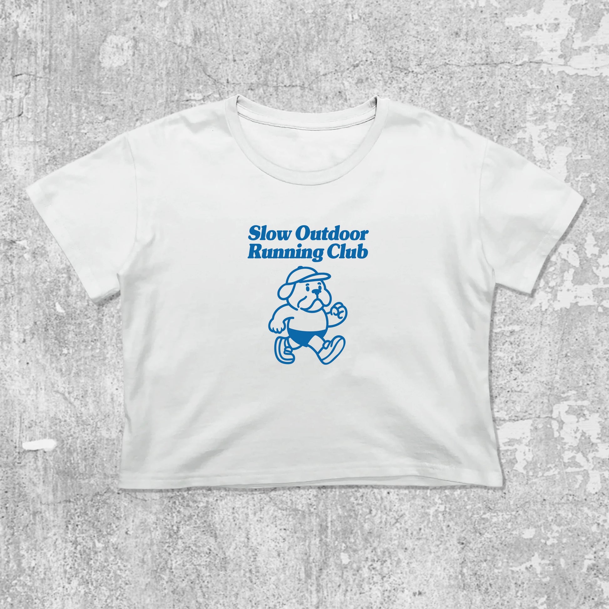 Slow Outdoor Running Club graphic crop tee with cute and trendy fit, featuring playful vintage graphic, stylish cut. White crop t-shirt